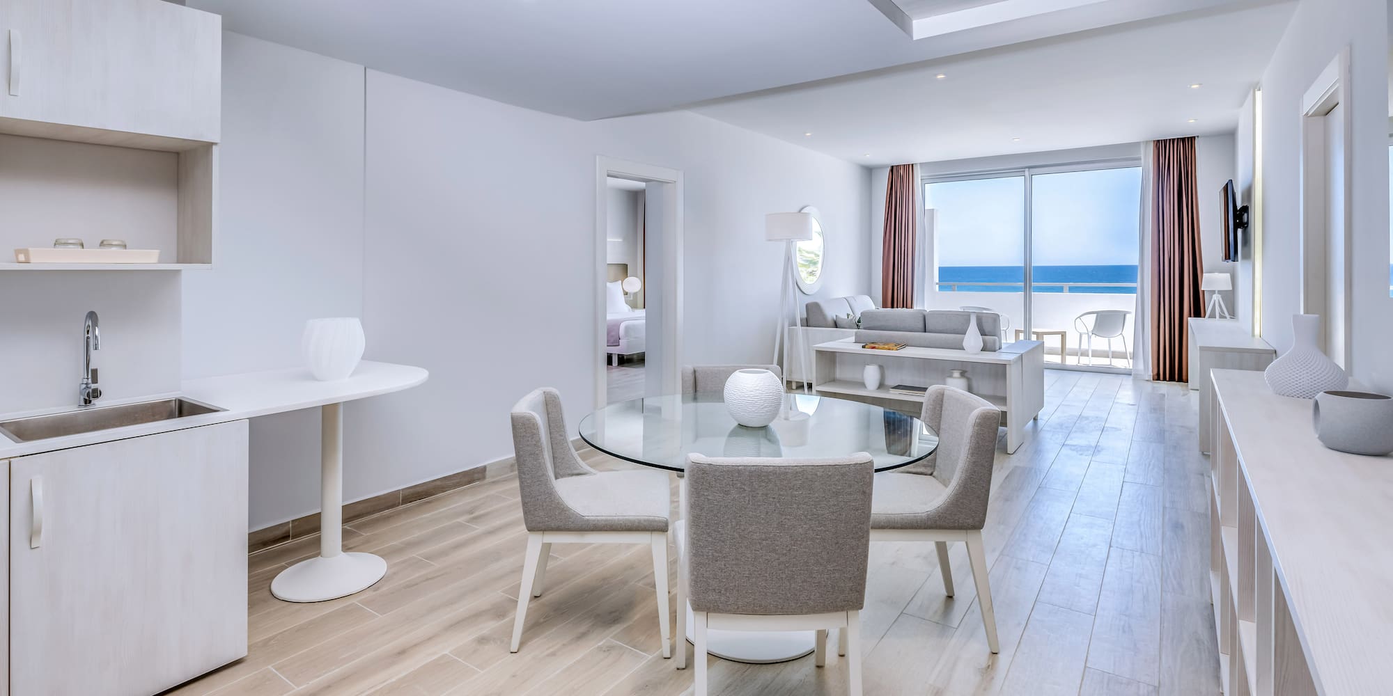 a room with a table and chairs