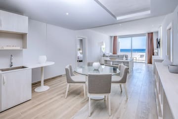 a room with a table and chairs