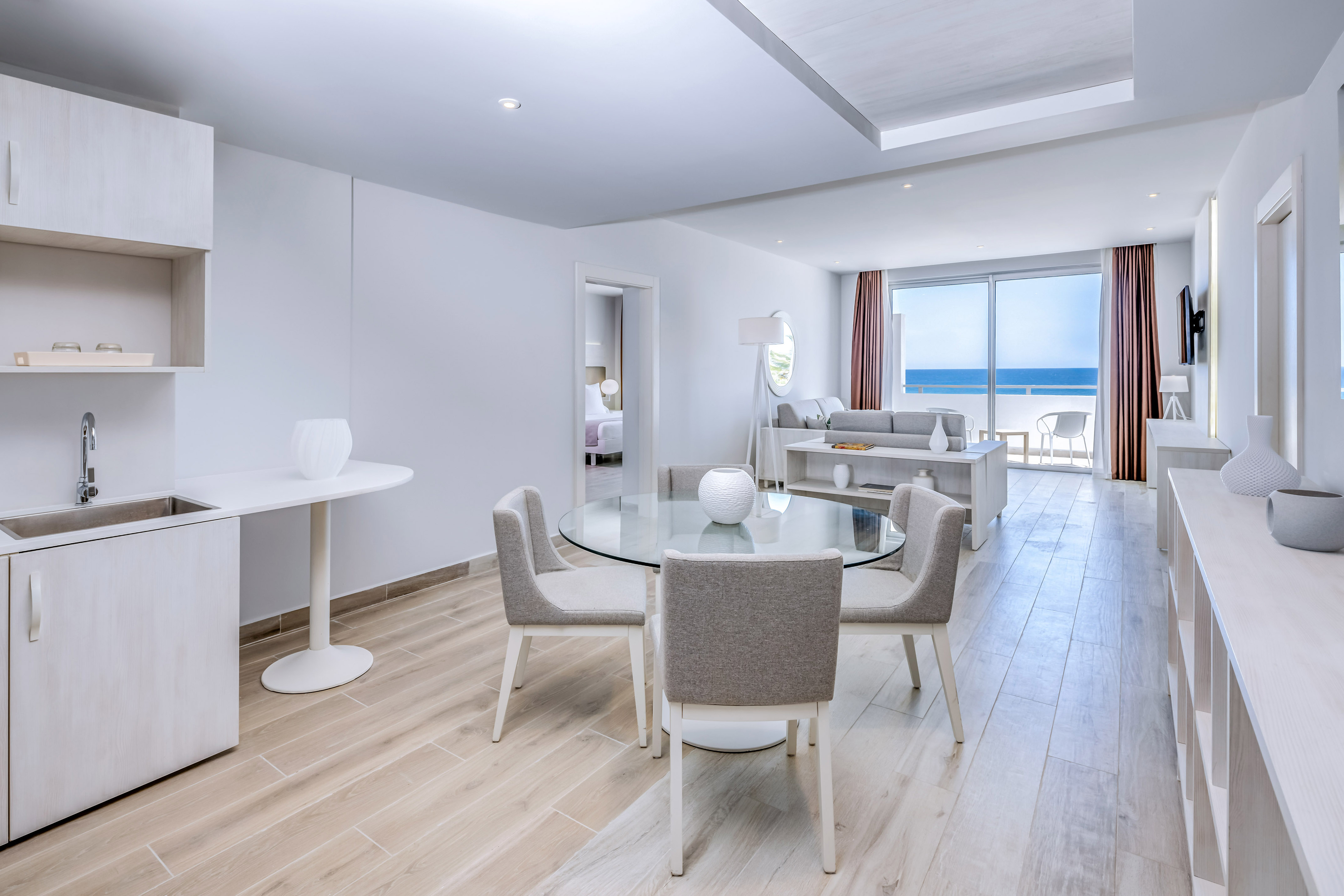 a room with a table and chairs