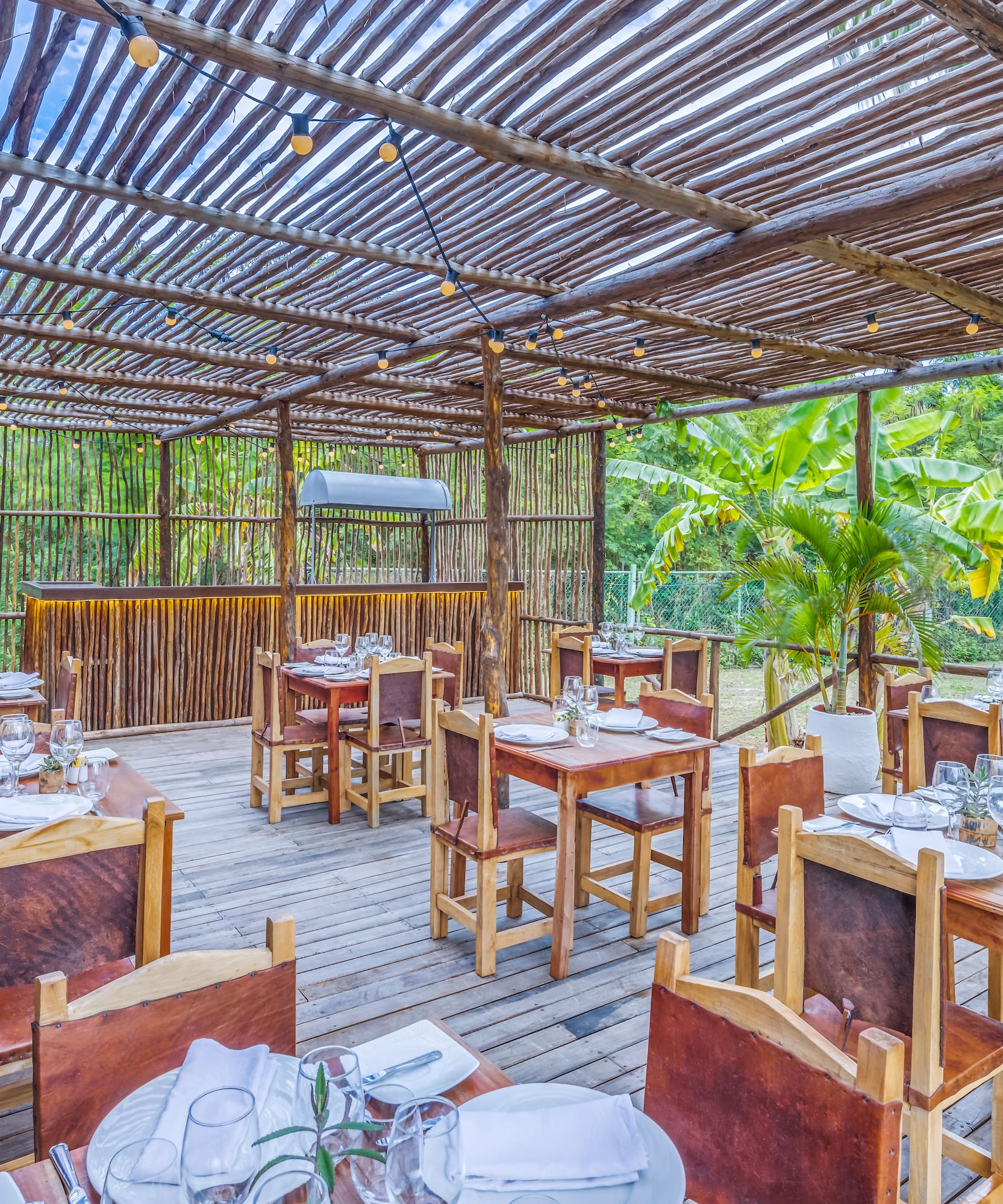 a restaurant with tables and chairs