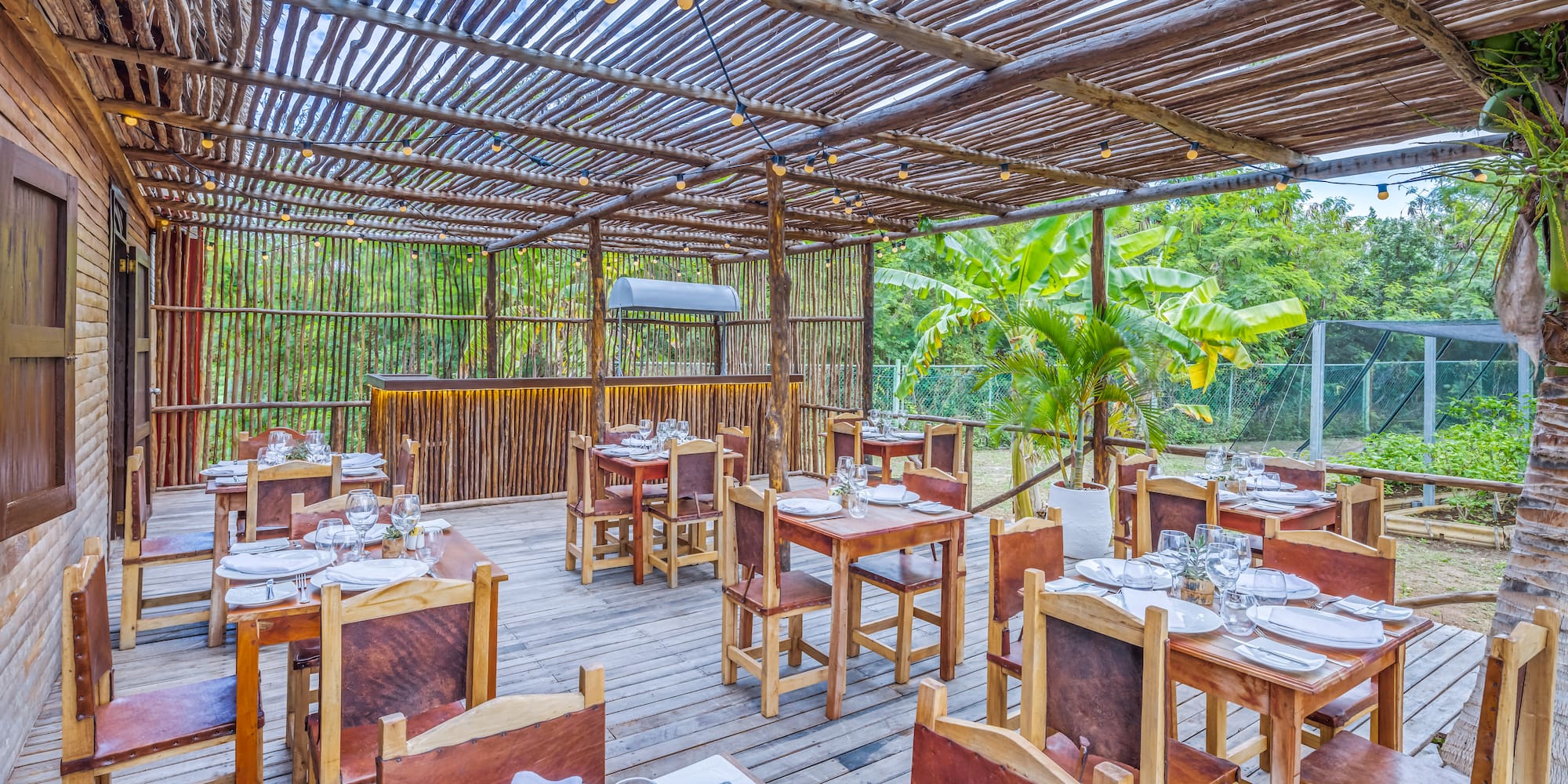 a restaurant with tables and chairs