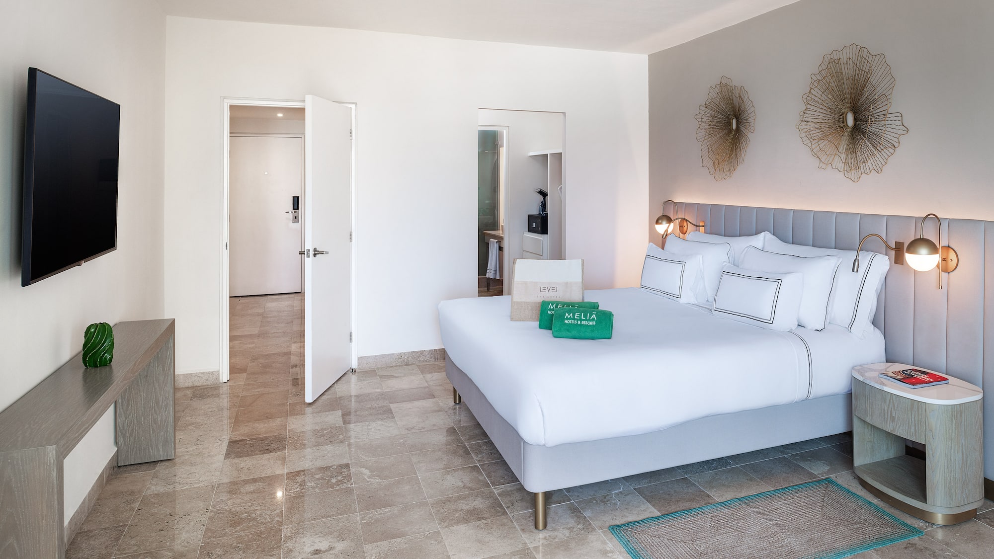 a bedroom with a bed and a mirror