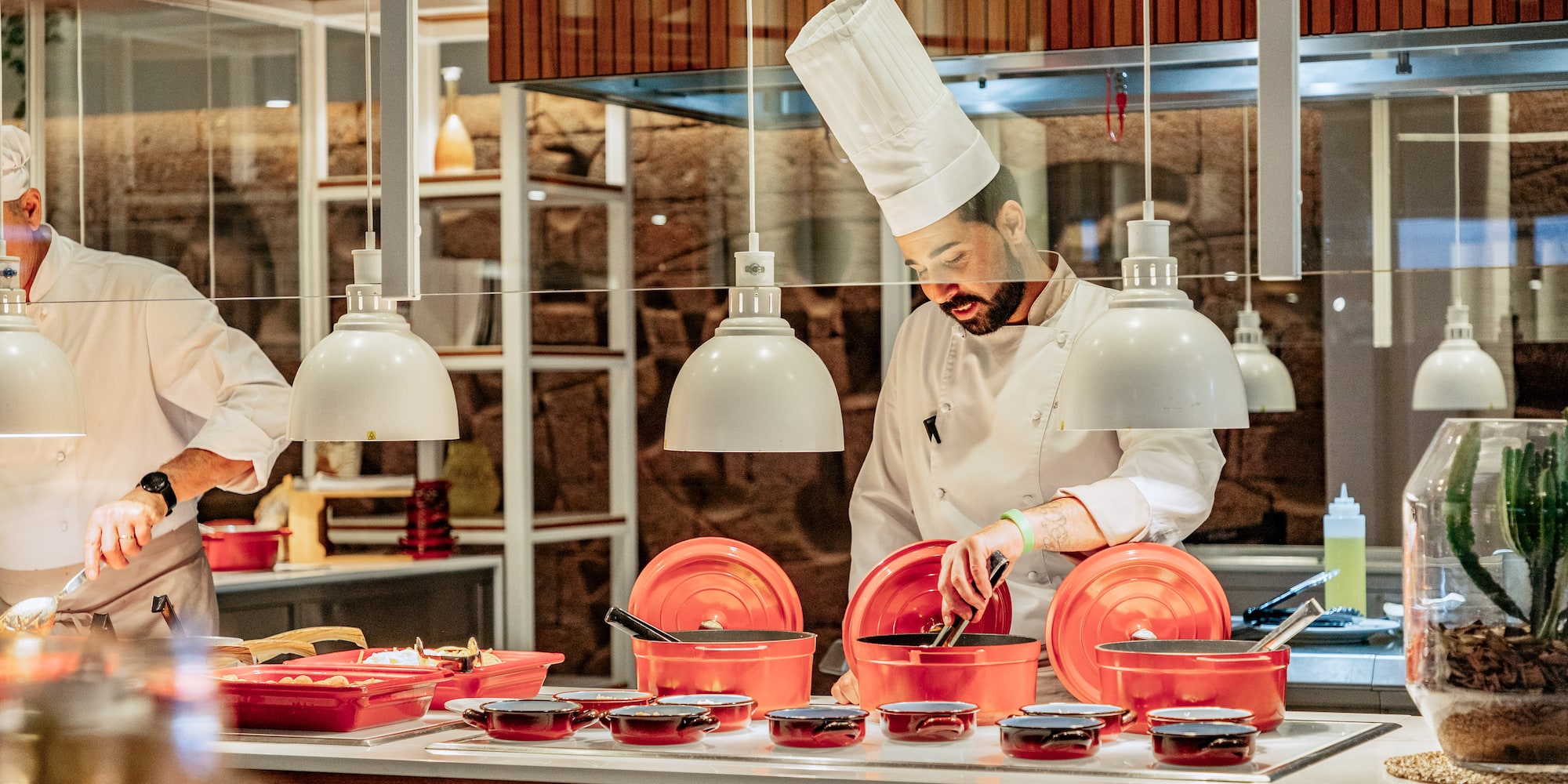 a chef preparing food in a kitchen