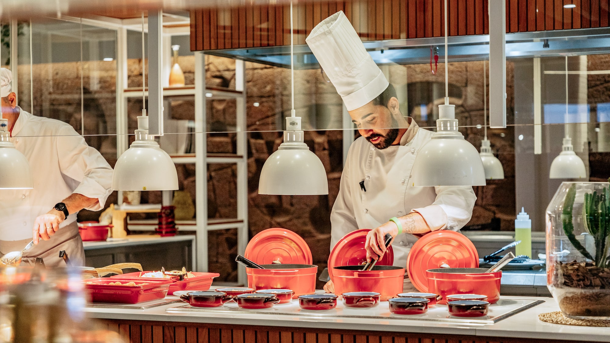 a chef preparing food in a kitchen