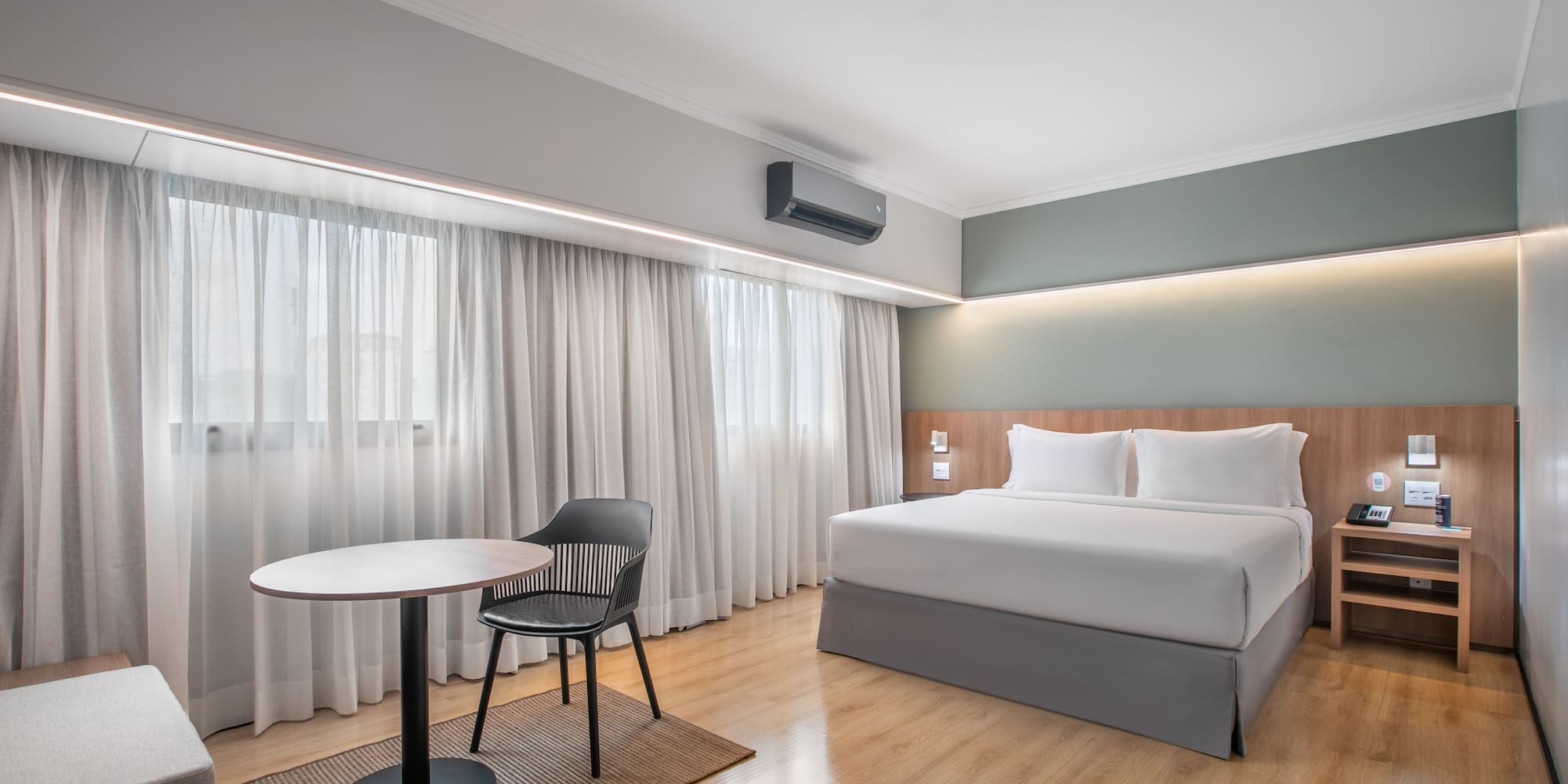 a room with a bed and a table