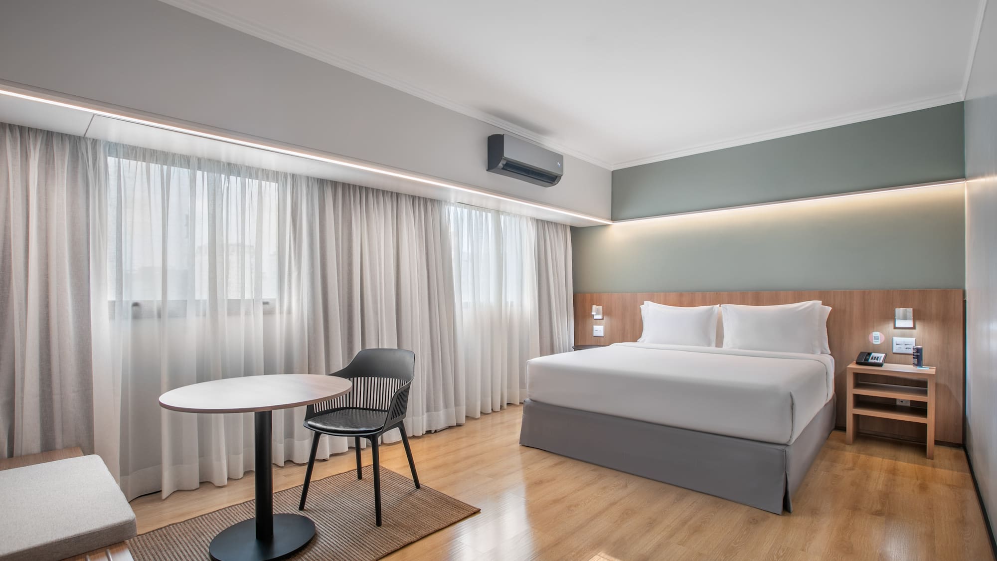 a room with a bed and a table