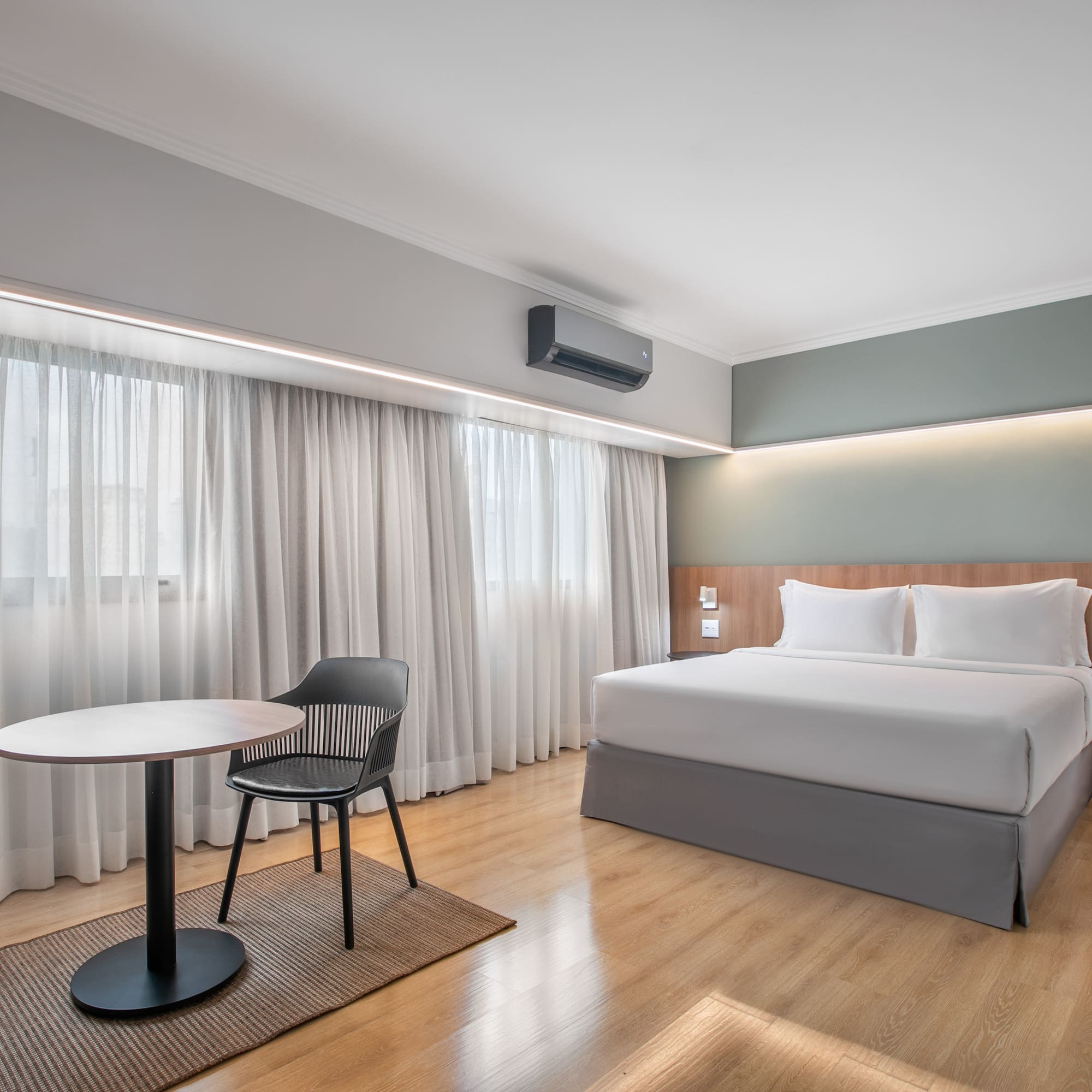 a room with a bed and a table