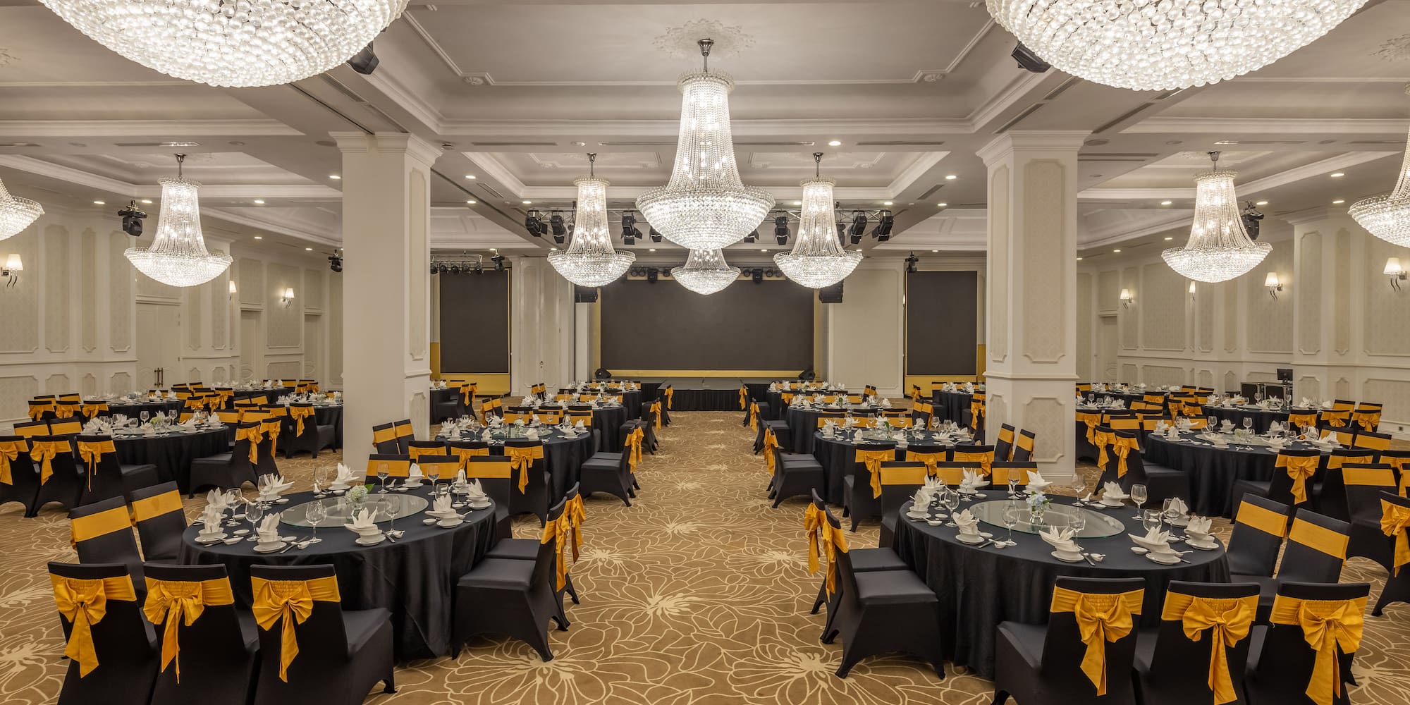 a large room with tables and chairs