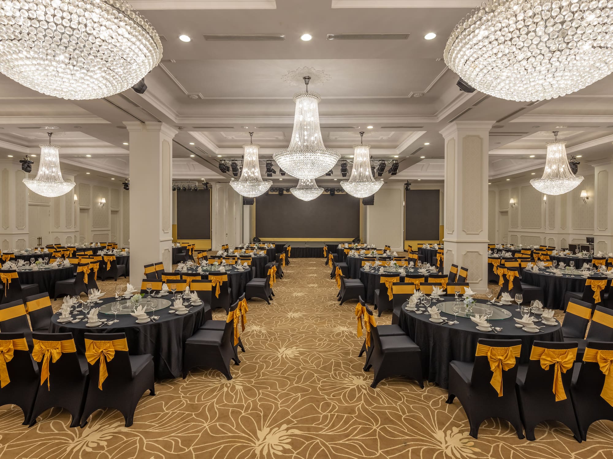 a large room with tables and chairs