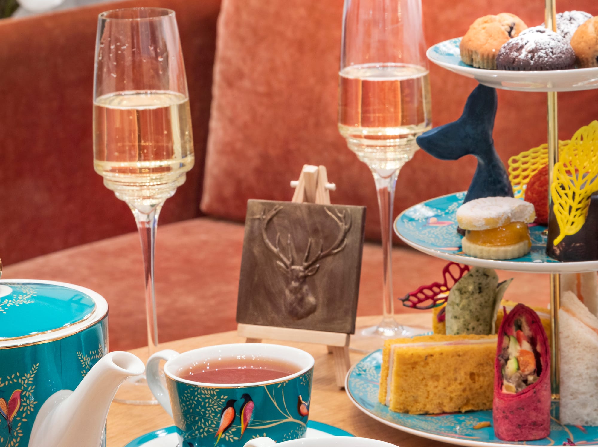 a tea set with tea cups and teapots