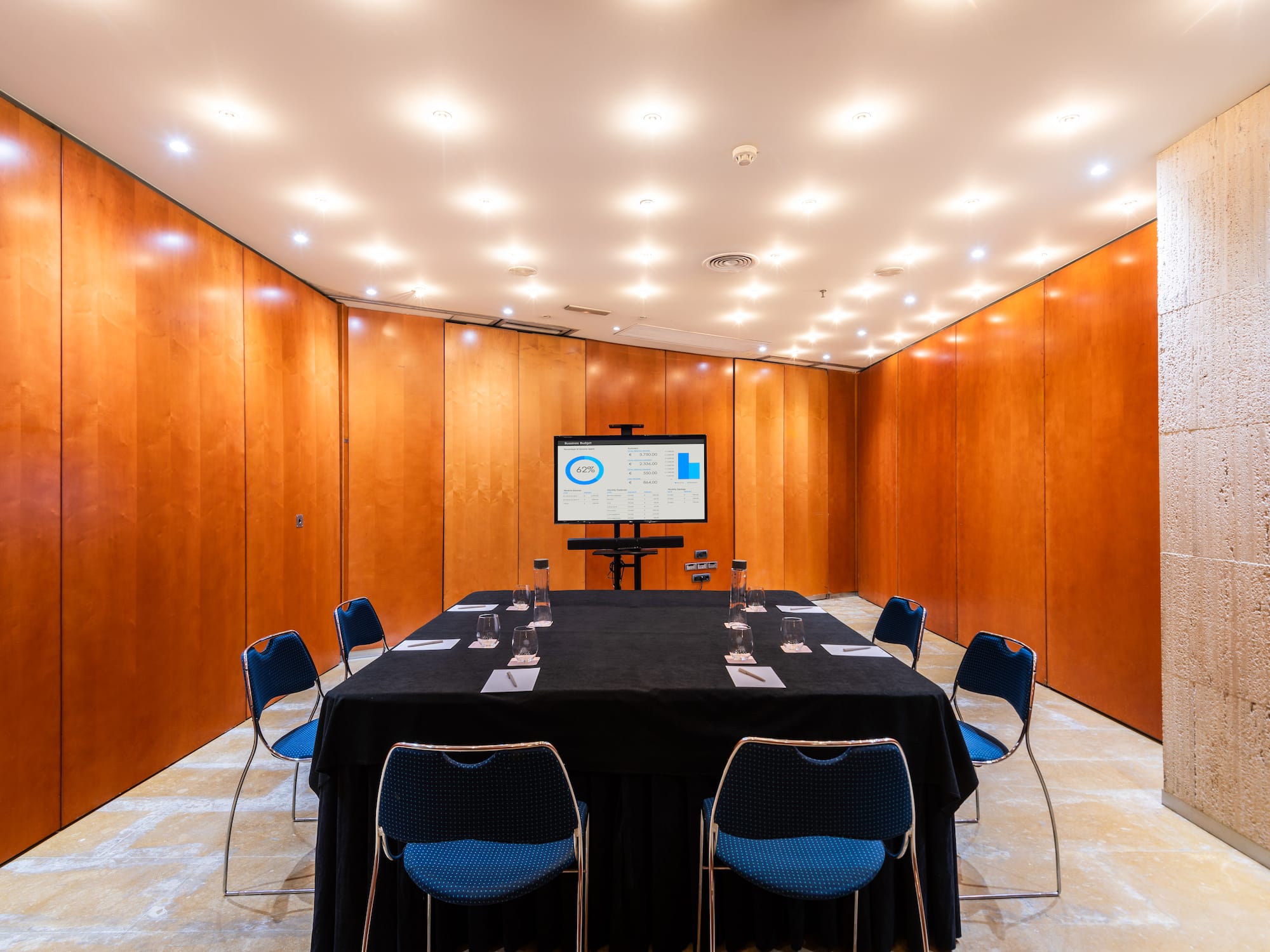 a room with a table and chairs
