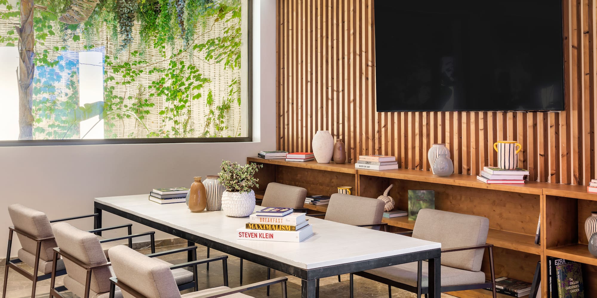 a room with a table and chairs