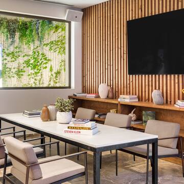a room with a table and chairs
