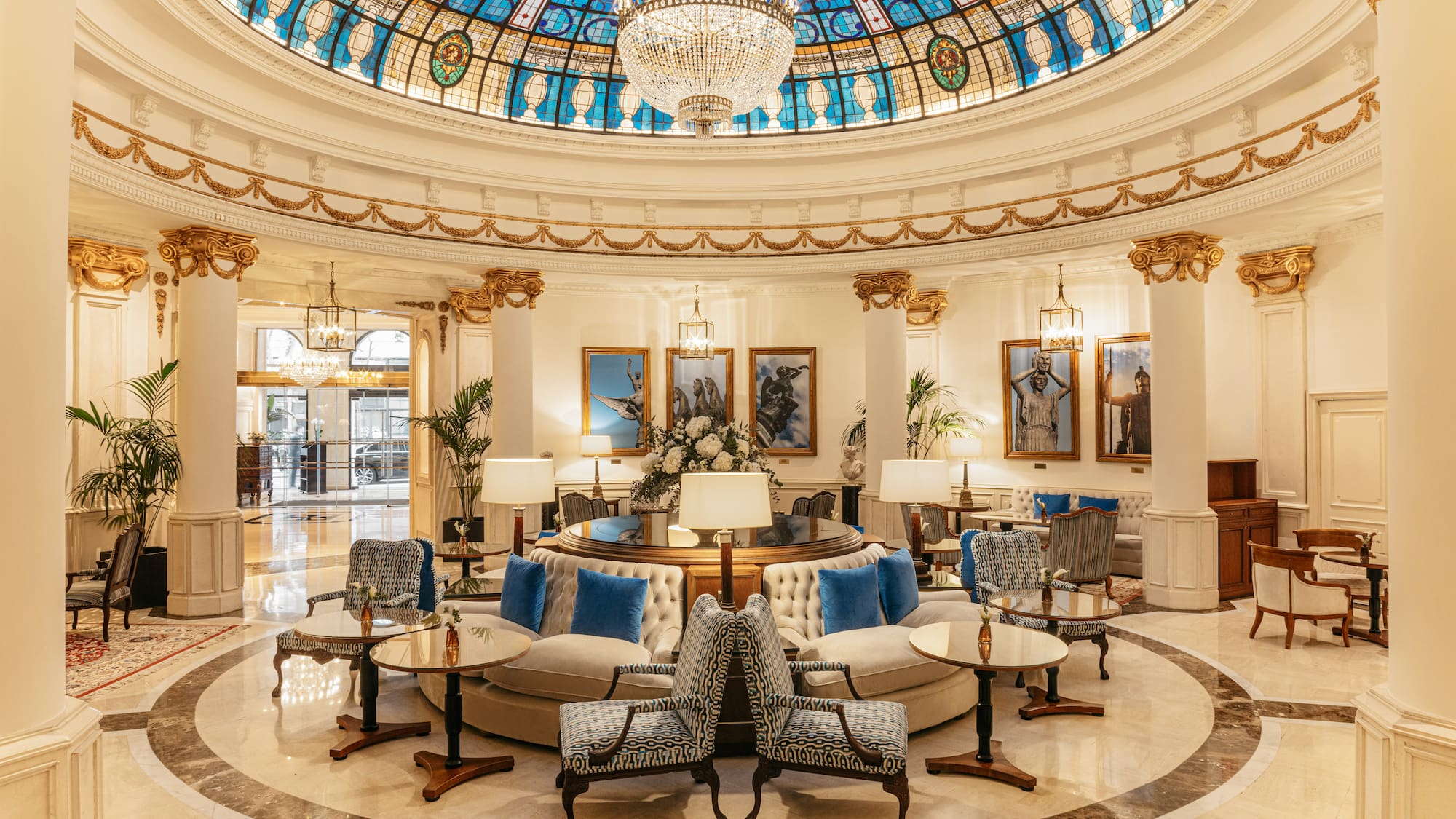 a large room with a round ceiling and a chandelier