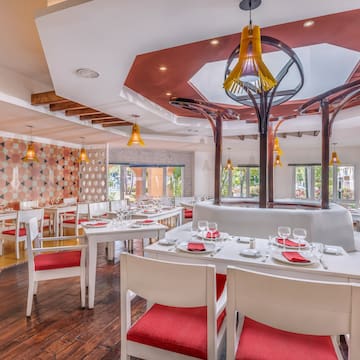 a room with tables and chairs