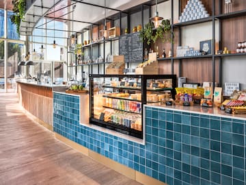 a counter with drinks and beverages on it