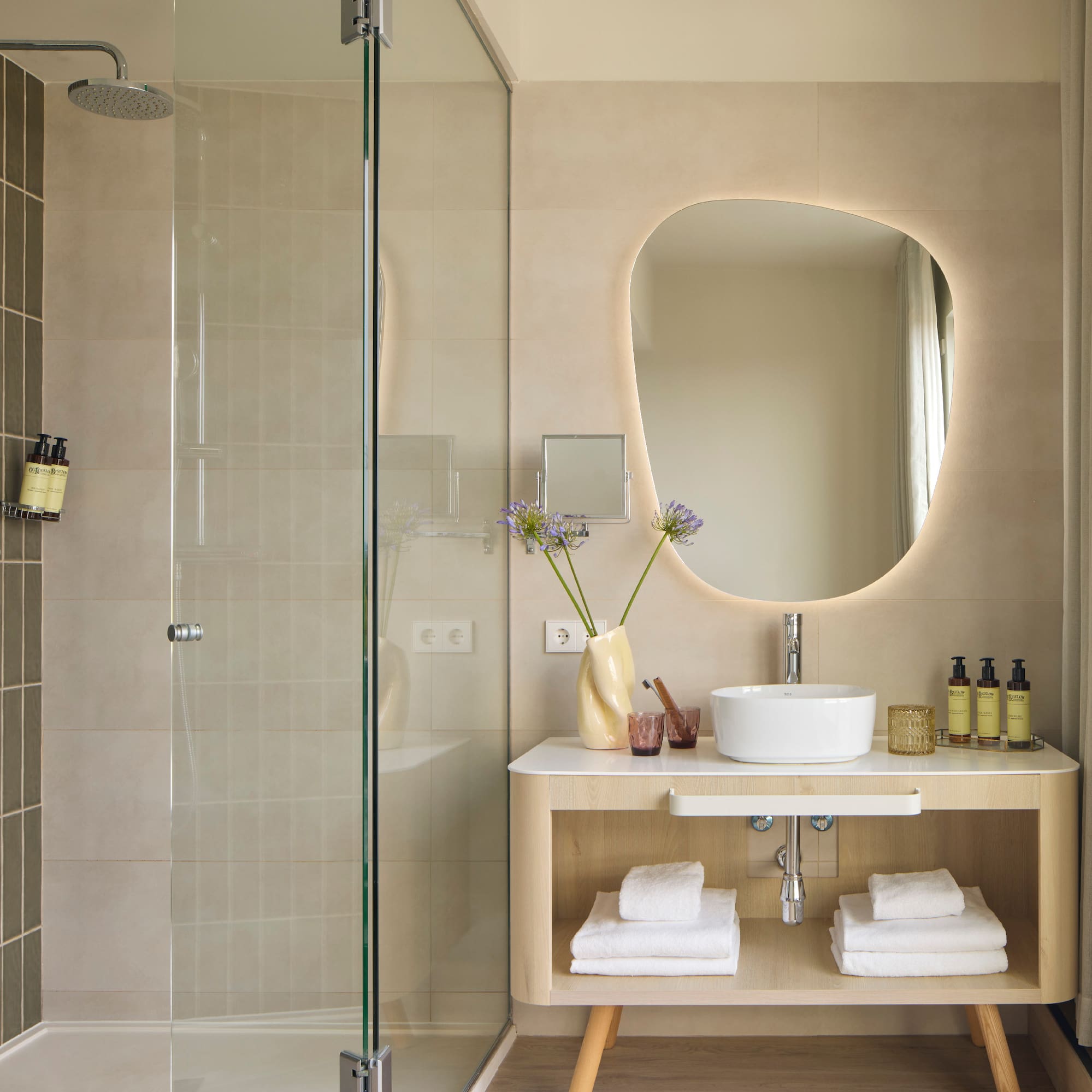 a bathroom with a mirror and a sink