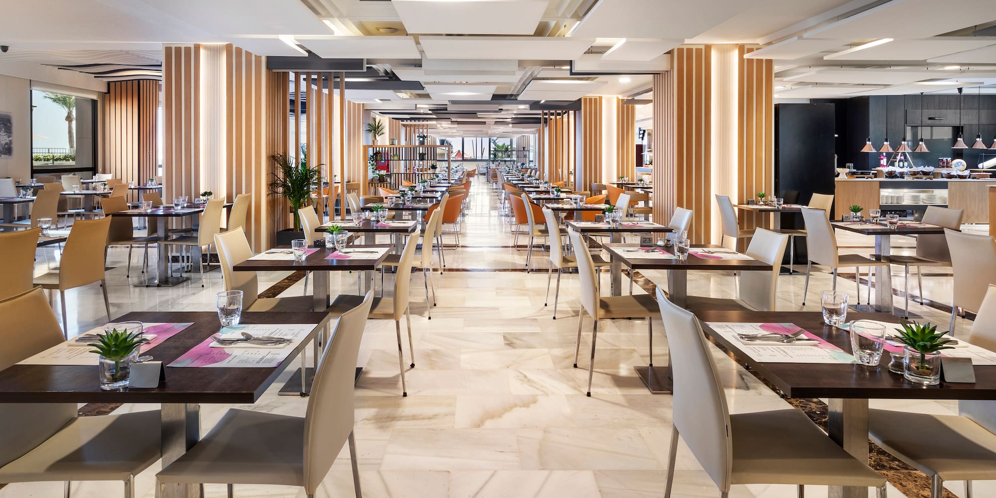 a room with tables and chairs