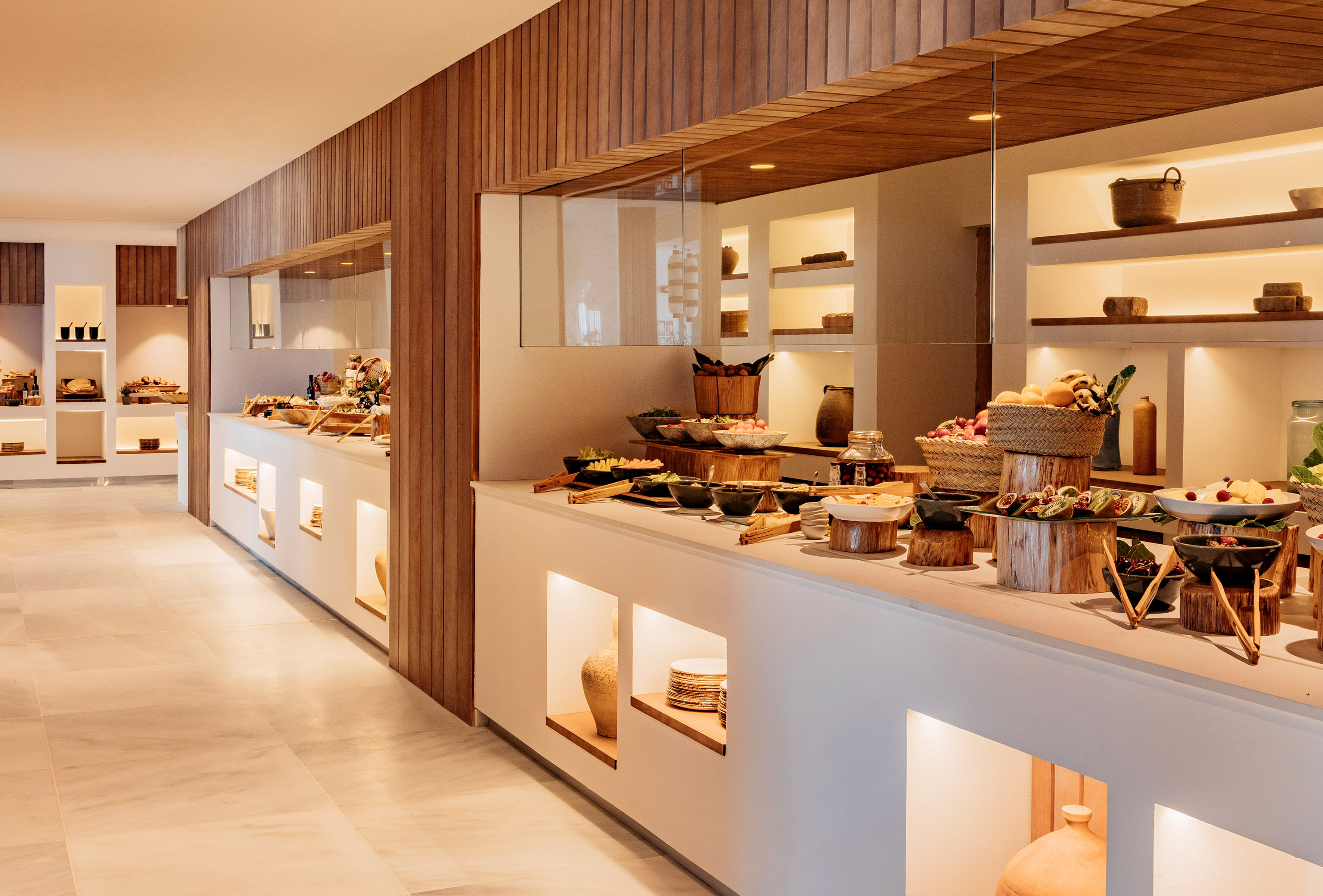 a buffet line with food on shelves