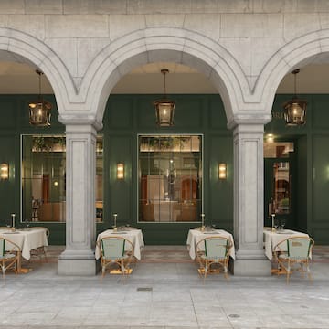 a restaurant with tables and chairs