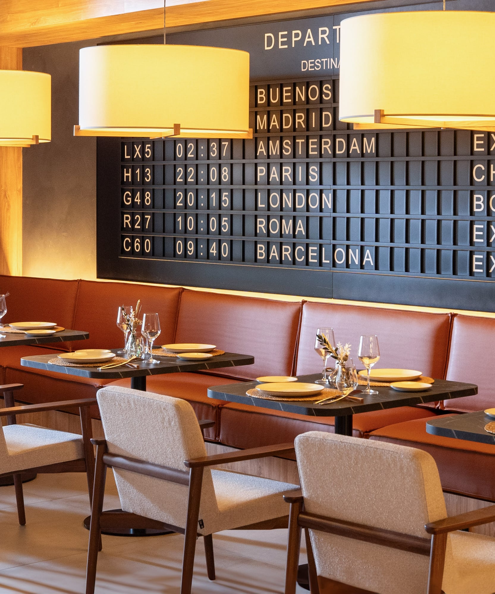 a restaurant with tables and chairs