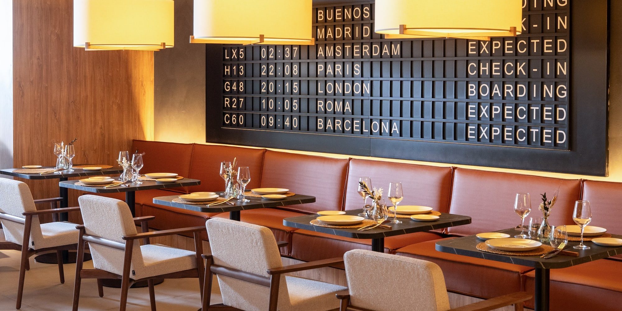 a restaurant with tables and chairs