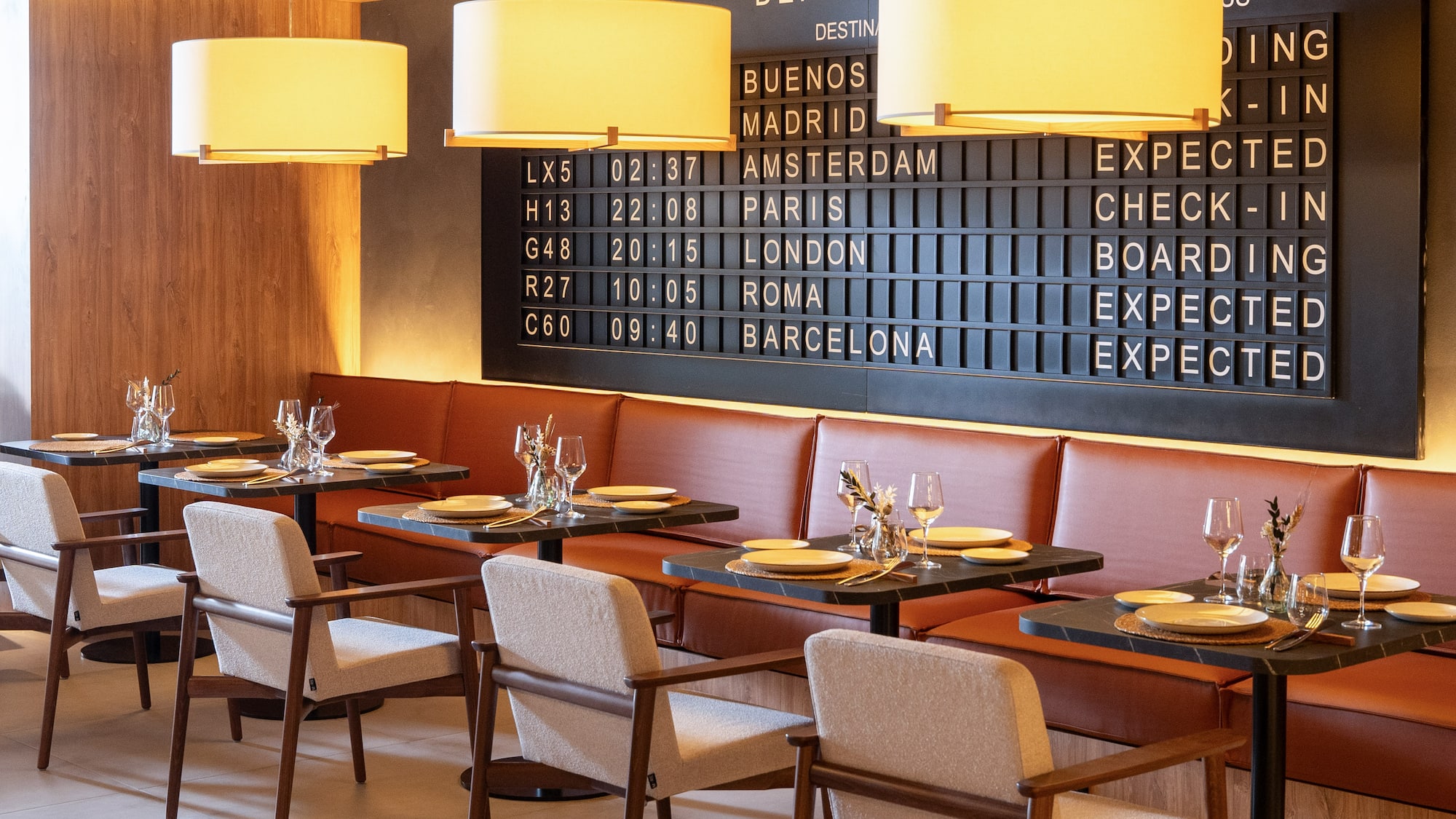 a restaurant with tables and chairs