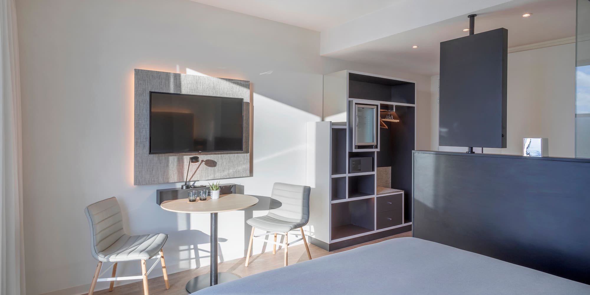 a room with a tv and a table