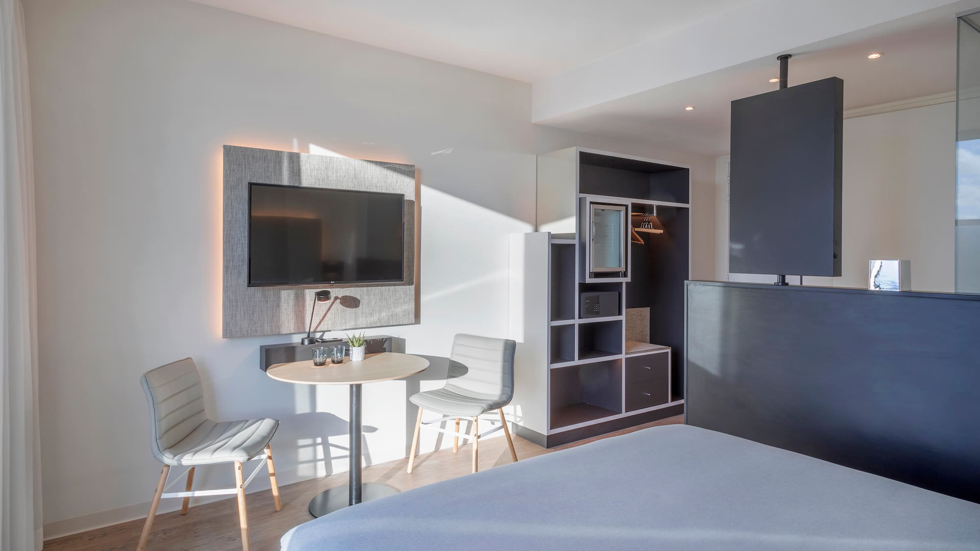 a room with a tv and a table