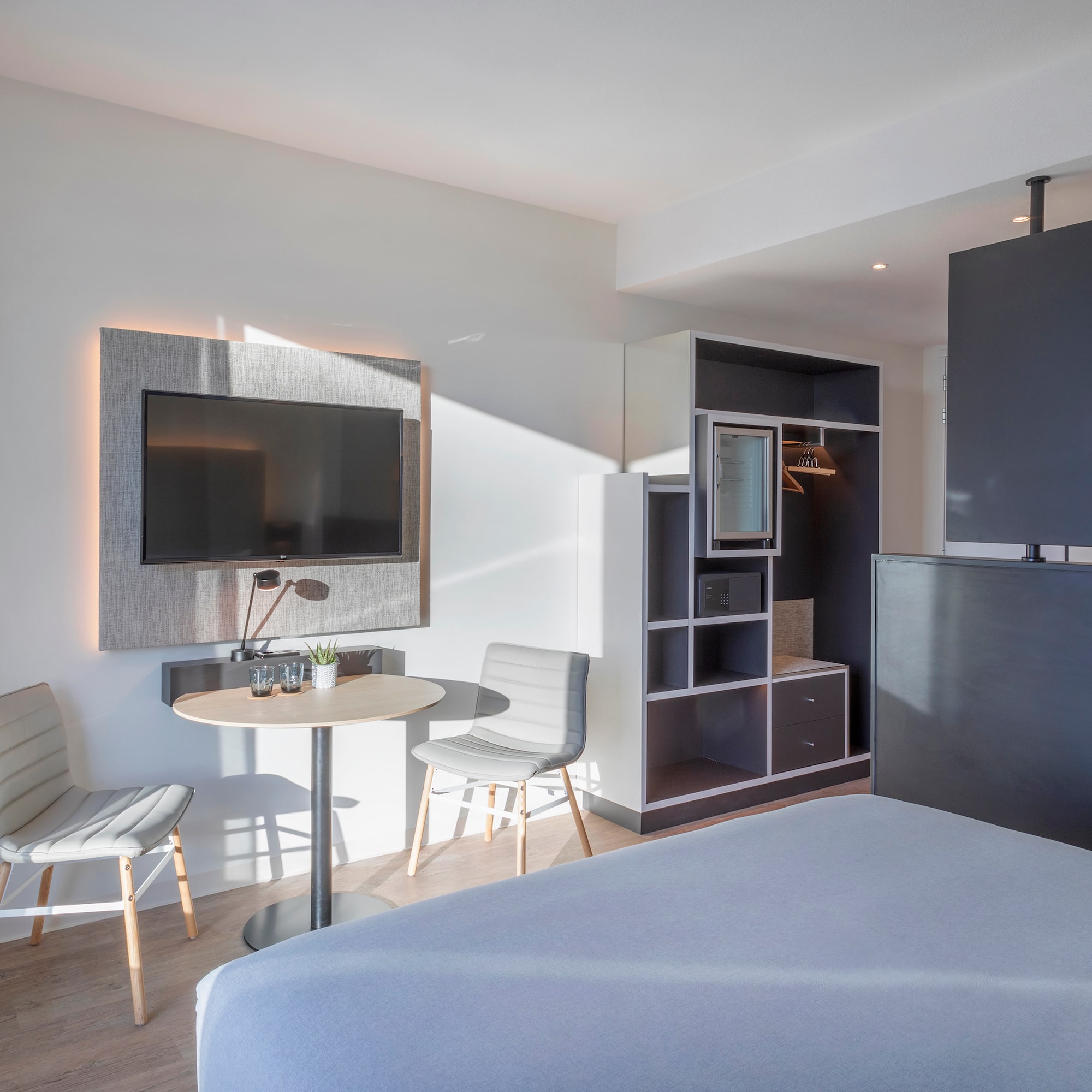 a room with a tv and a table