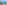 Balcony view: coastal city, expansive bay, mountains, palm trees.