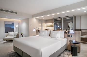 a room with a bed and a table