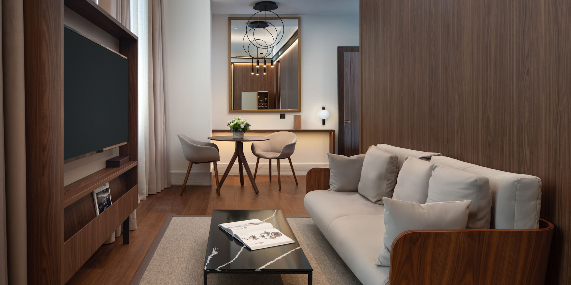 a living room with a couch and a table