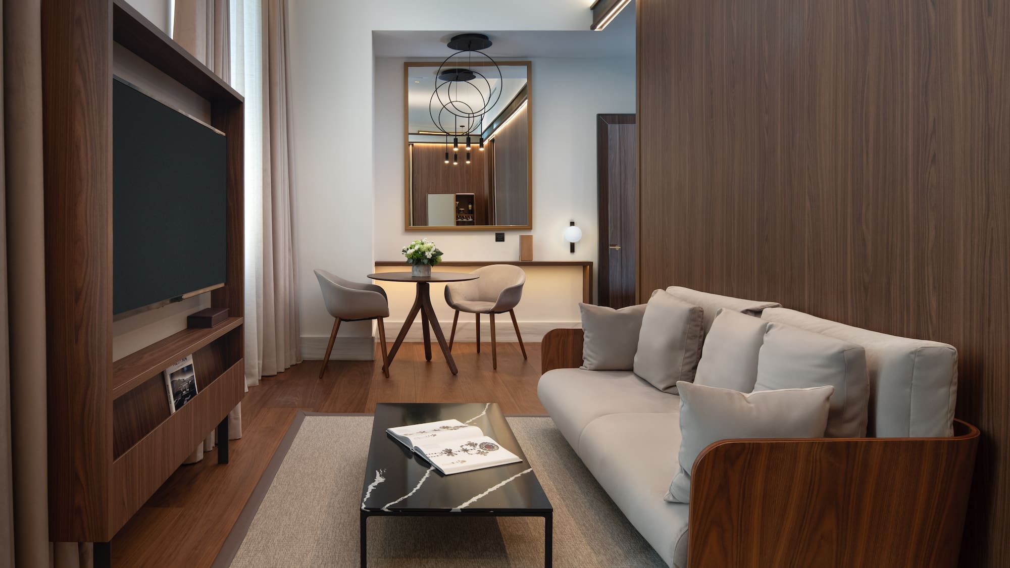 a living room with a couch and a table