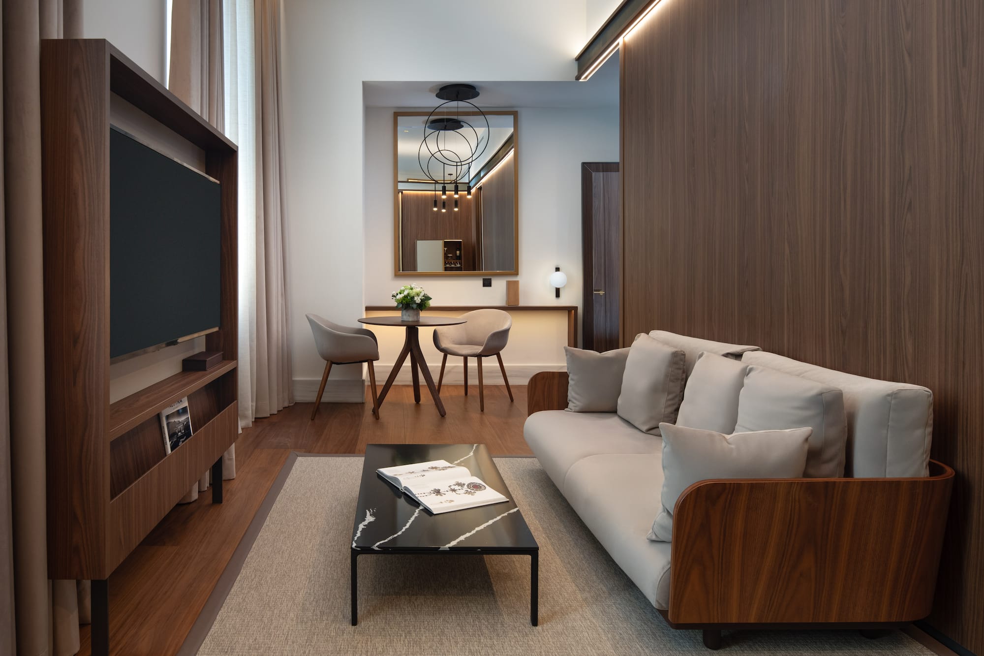 a living room with a couch and a table