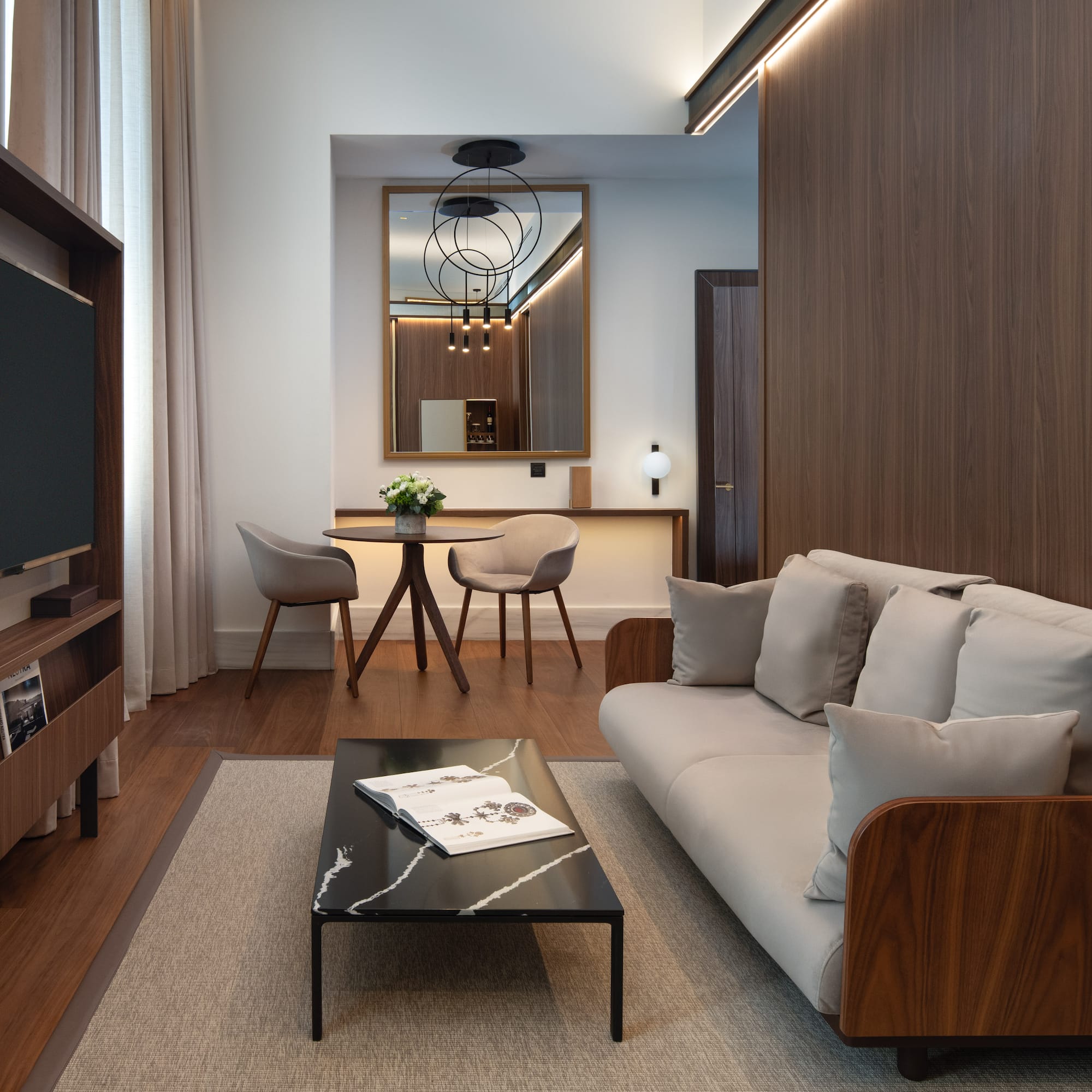 a living room with a couch and a table