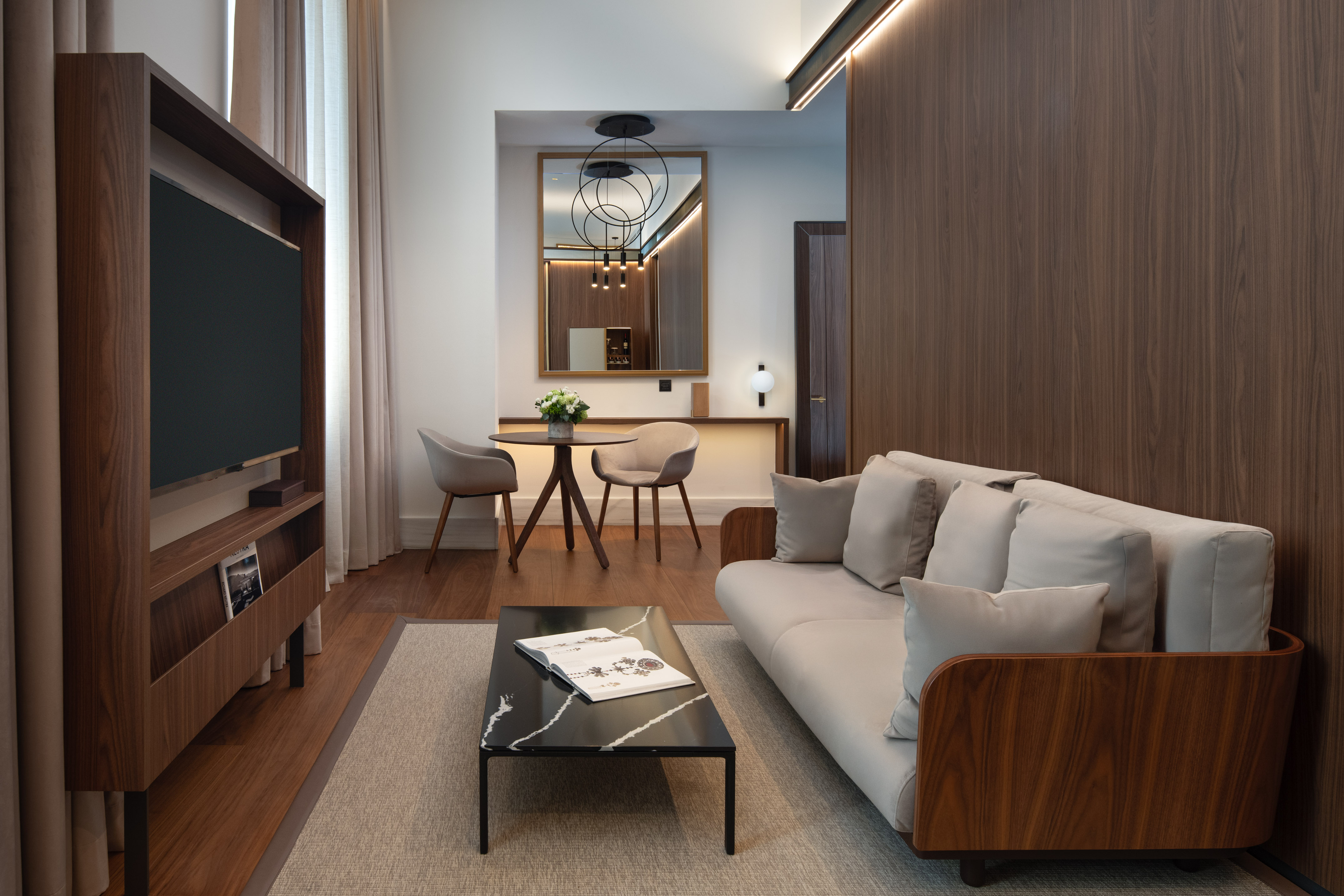 a living room with a couch and a table