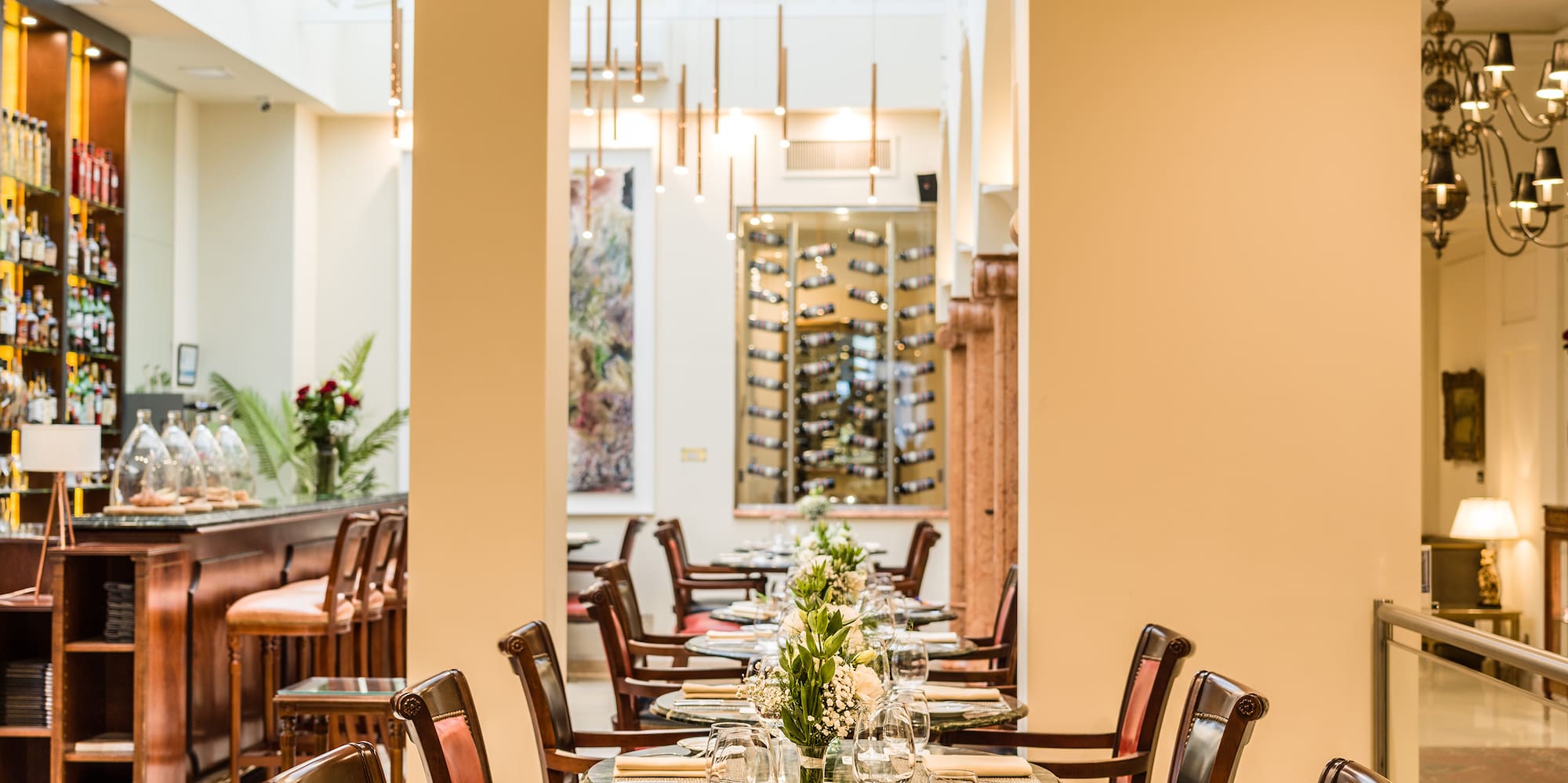 a restaurant with tables and chairs