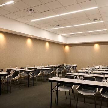 a room with tables and chairs