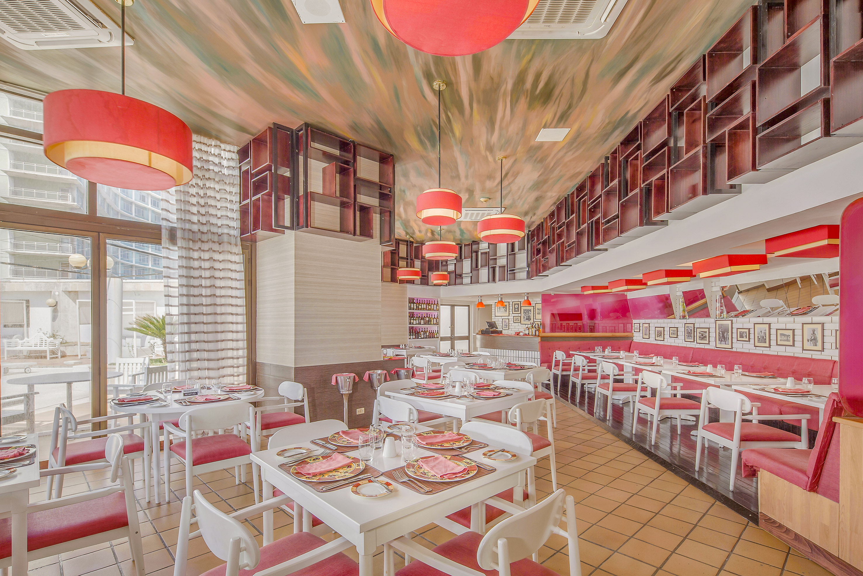 a room with tables and chairs