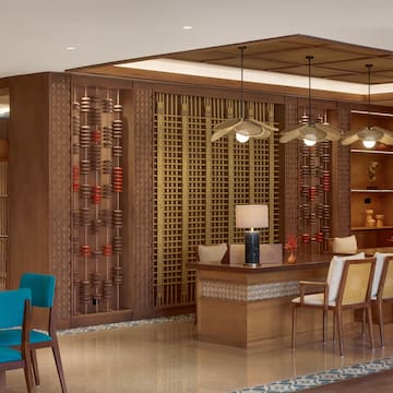 a room with a table and chairs