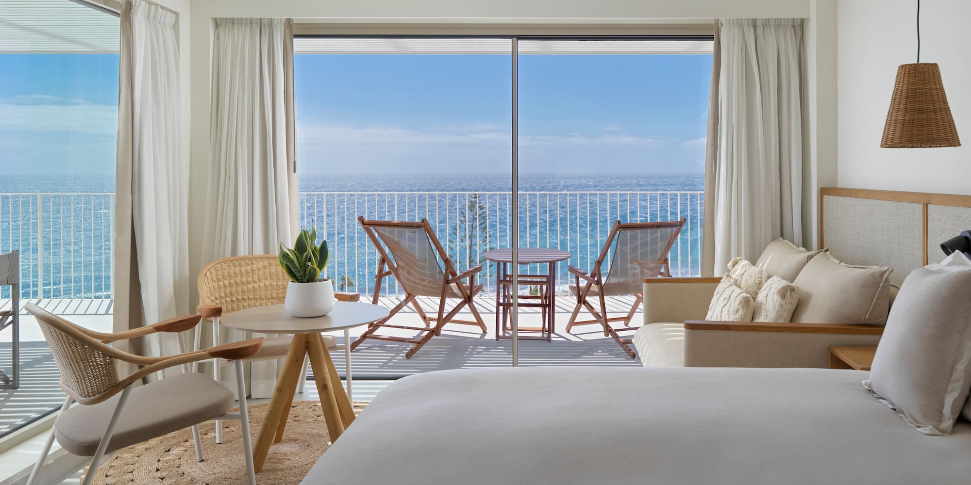 a room with a view of the ocean