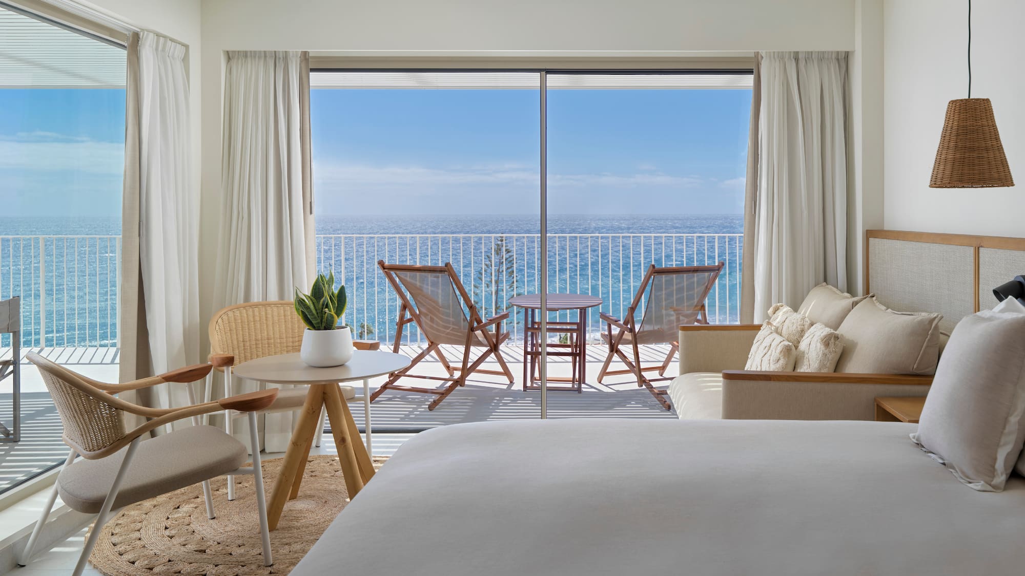 a room with a view of the ocean