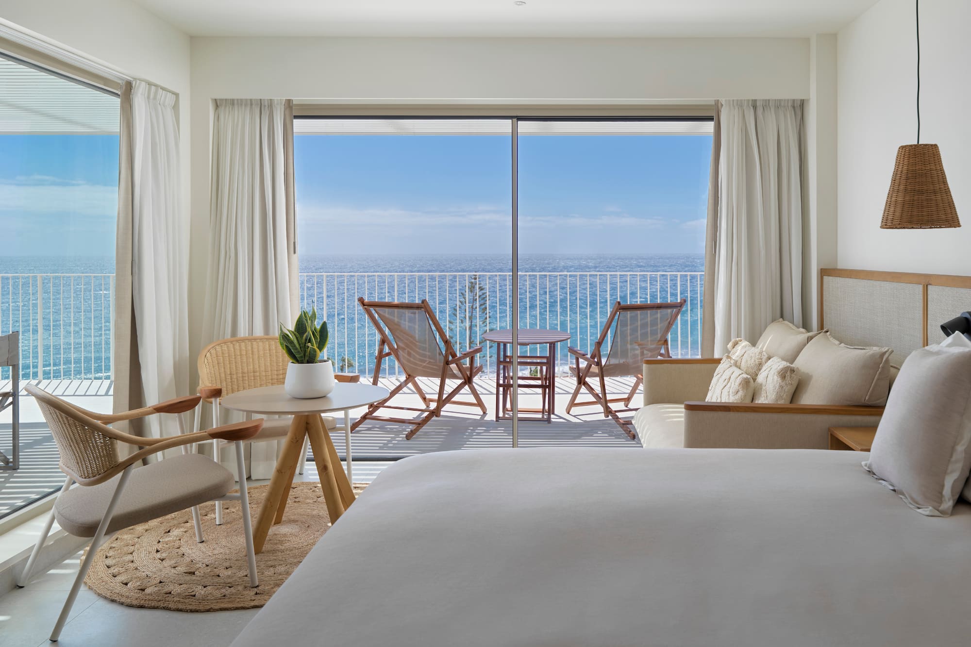 a room with a view of the ocean