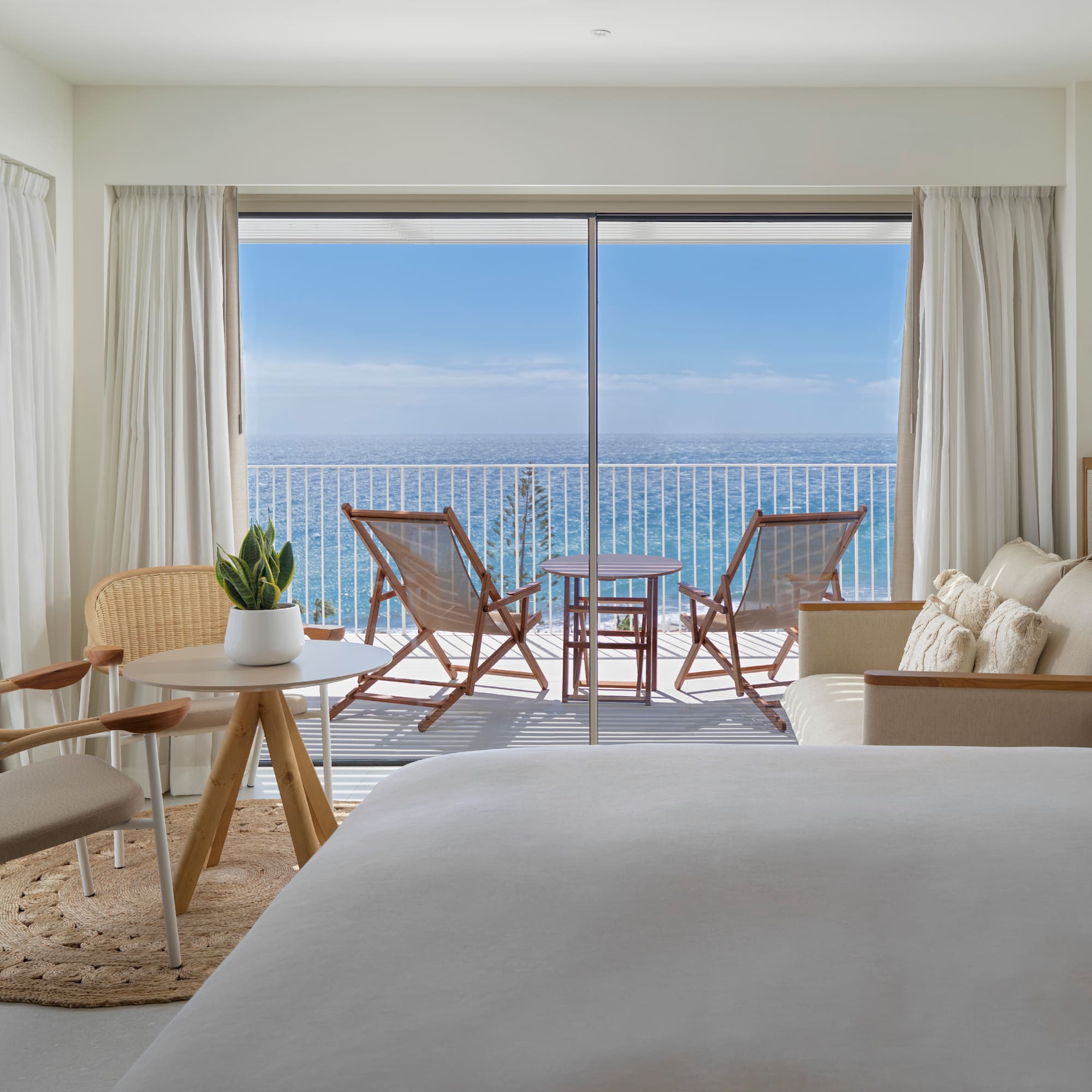 a room with a view of the ocean