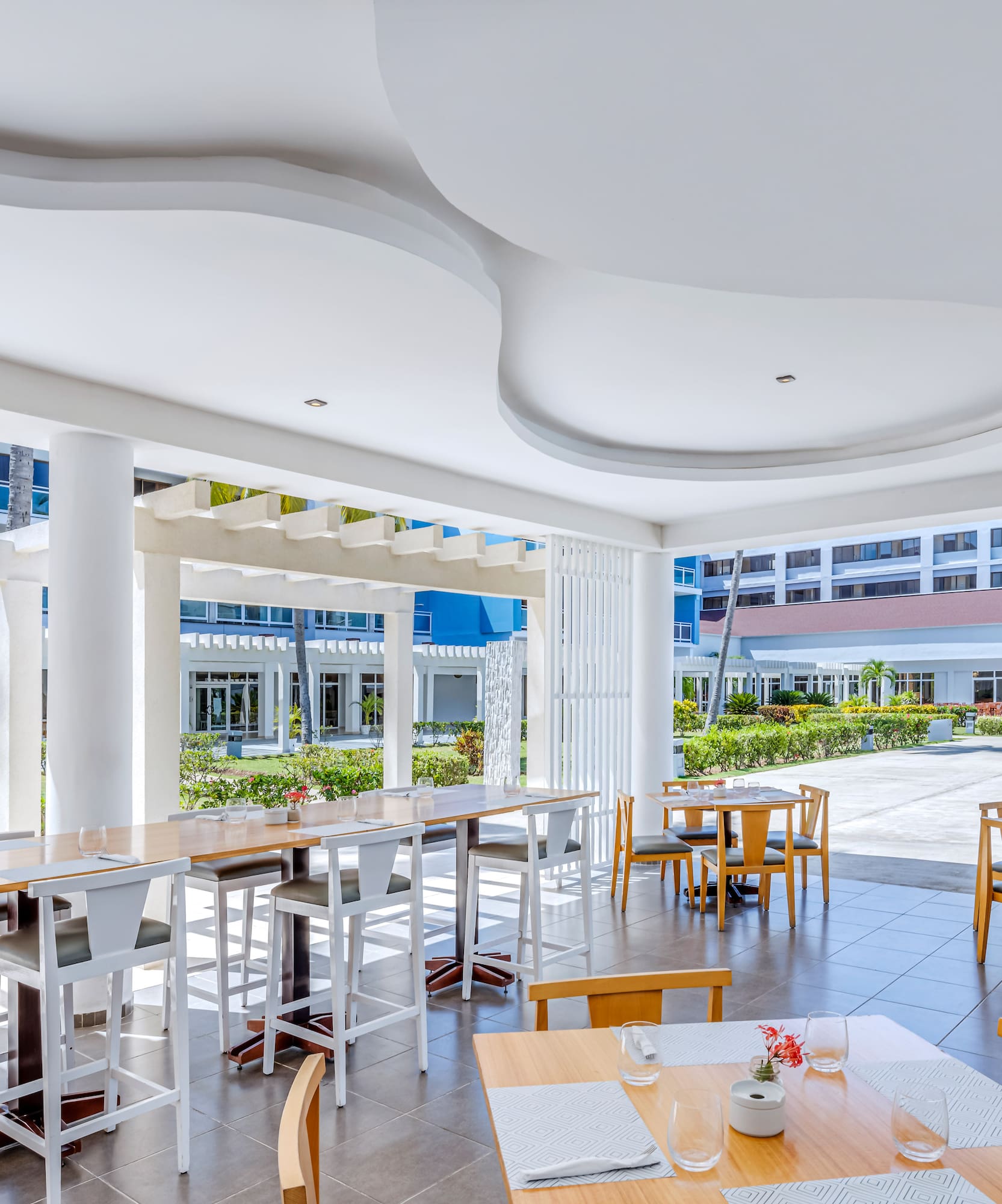 a room with tables and chairs