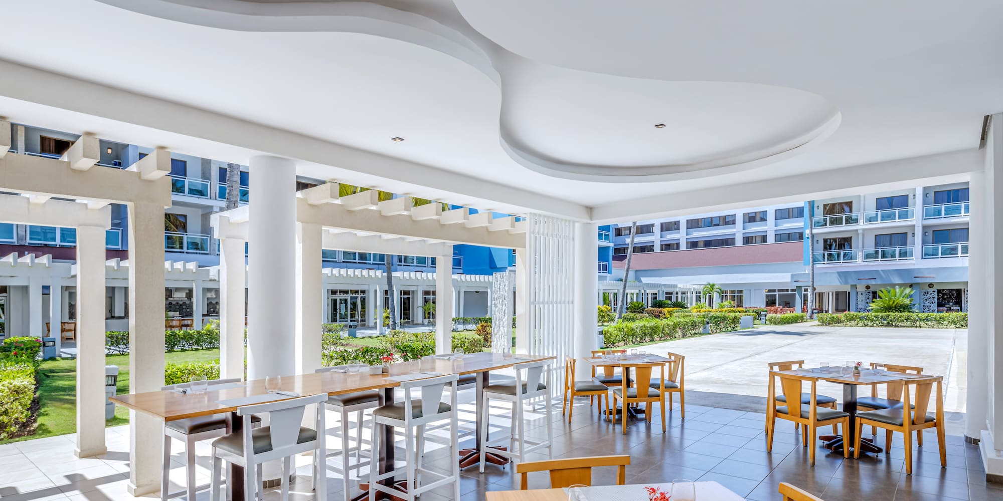 a room with tables and chairs