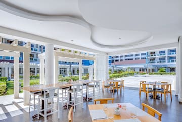 a room with tables and chairs