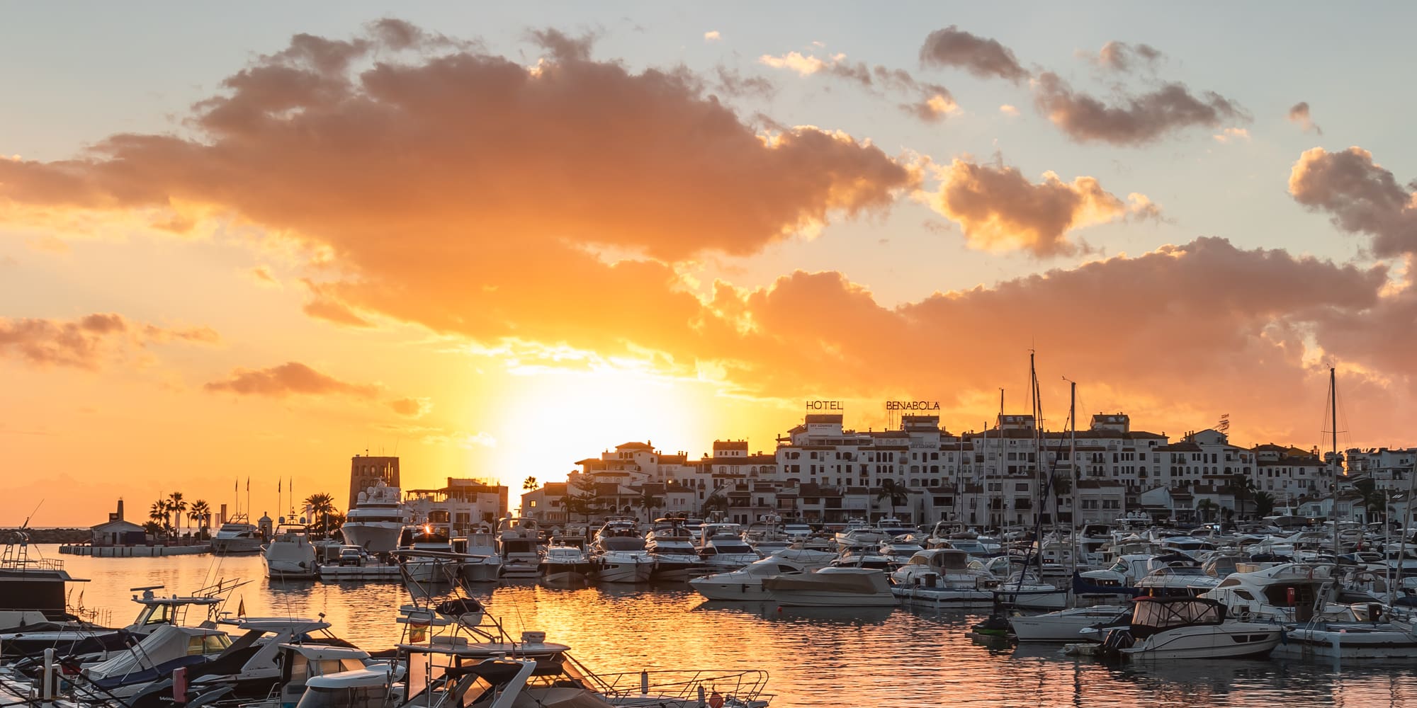 a group of boats in a harbor
