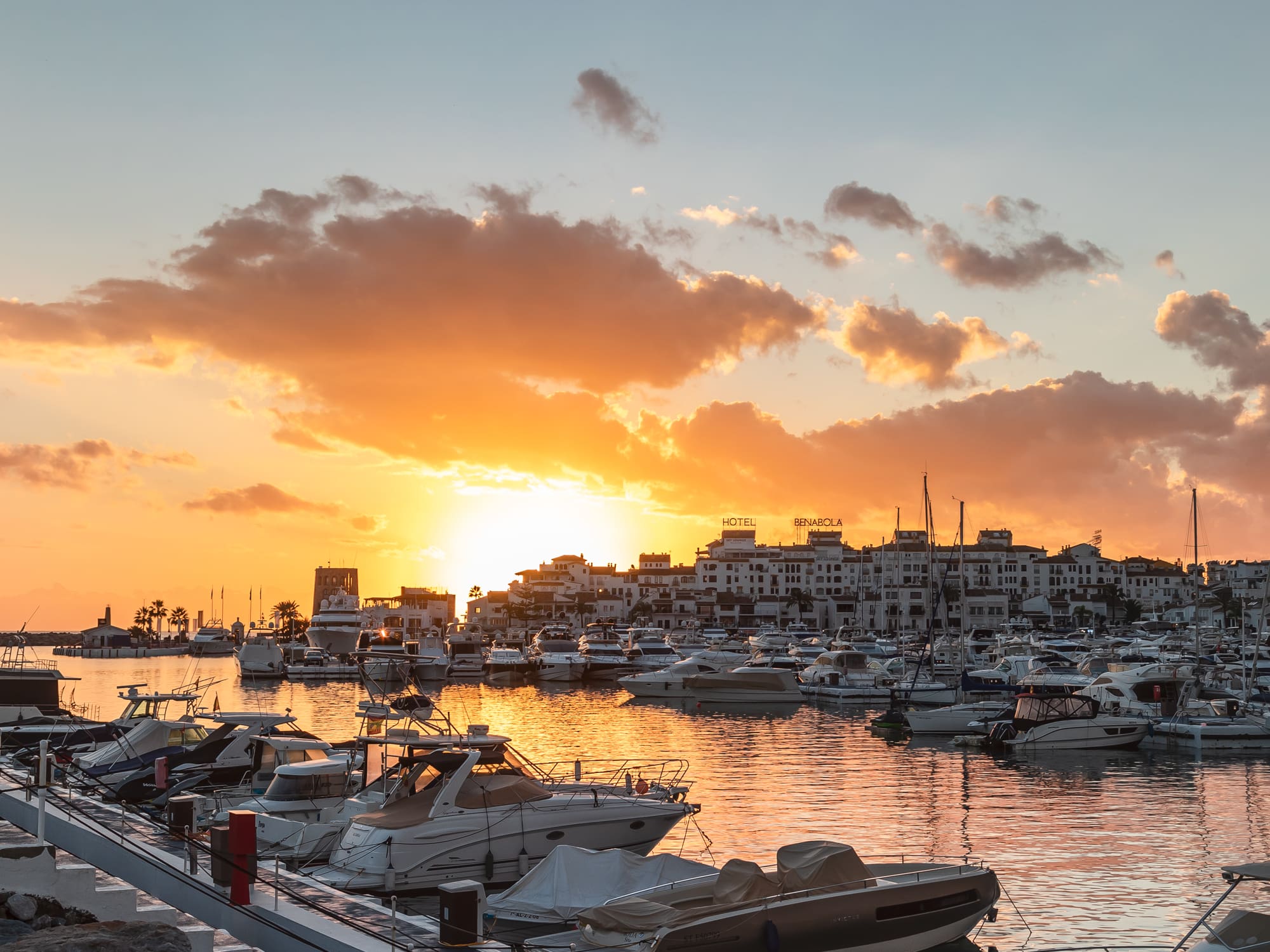 a group of boats in a harbor